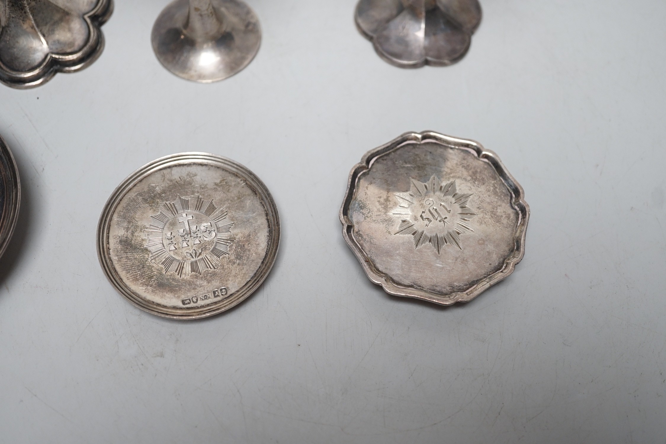 Three Victorian silver communion chalices, largest Thomas Thomason & Co, Birmingham, 1867, 10.1cm, Rawlings & Summers, London, 1854 and Josiah Williams & Co, London, 1889, together with three Victorian silver patens, lar
